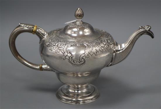 A late George II silver inverted pear shaped teapot by Lothian & Robertson, Edinburgh, 1759, gross 24 oz.